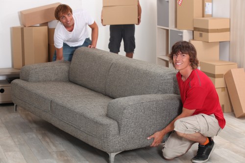 Removal team packing household items for a Soho move