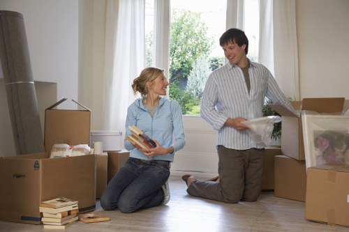 Packed boxes and home moving equipment for a Soho house removal